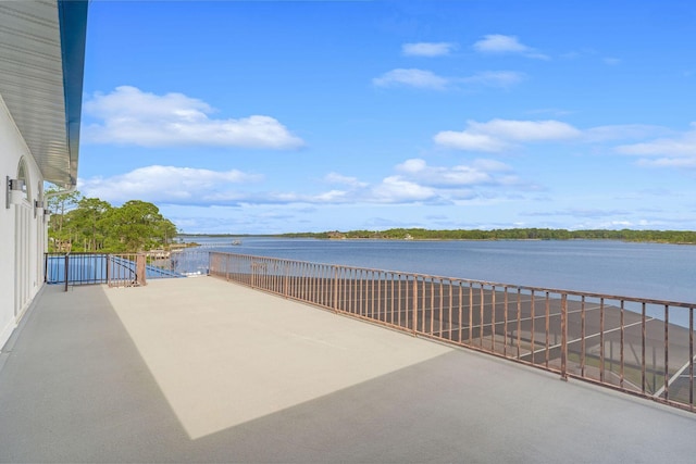 view of patio / terrace featuring a water view