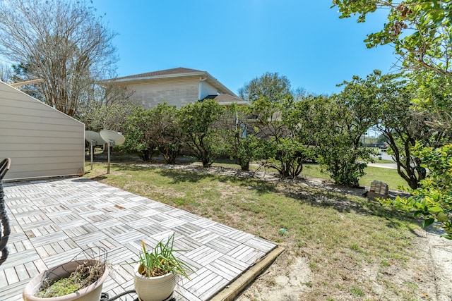 view of yard with a patio area