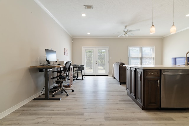 office area with visible vents, crown molding, baseboards, french doors, and light wood-style floors