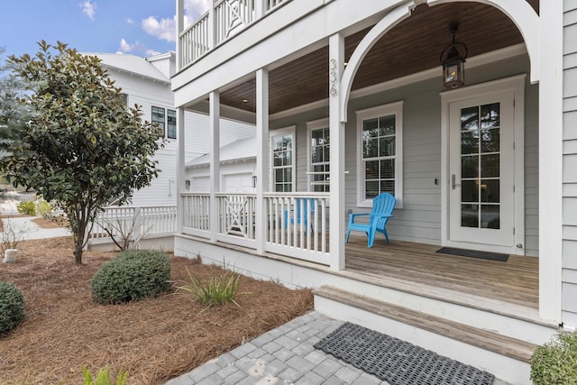 entrance to property featuring a porch