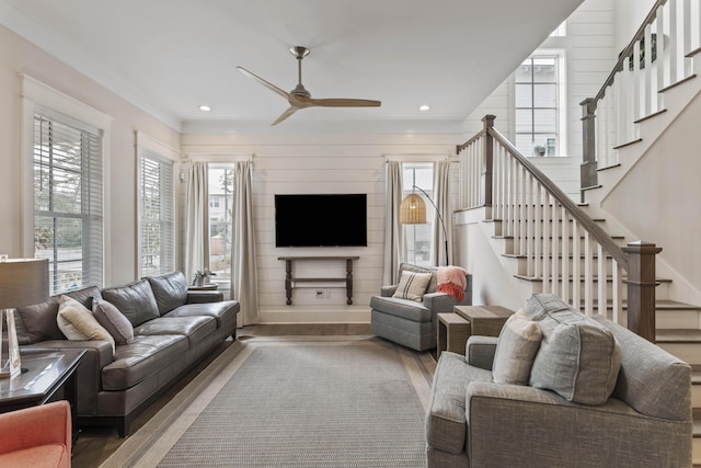 living room with a ceiling fan, recessed lighting, stairway, and wood finished floors