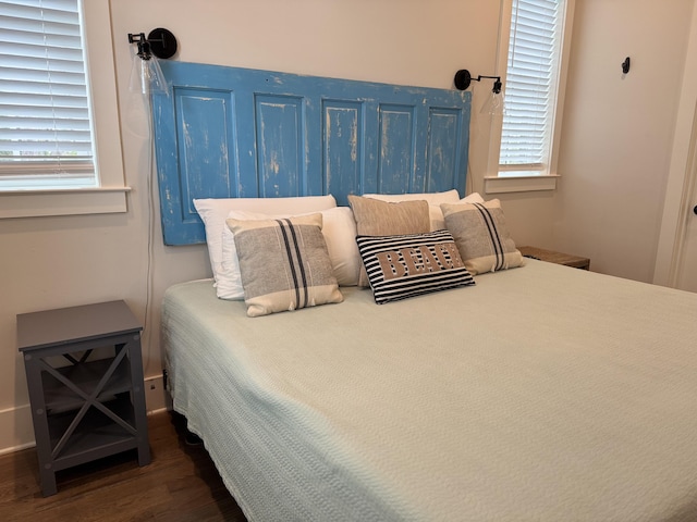 bedroom featuring wood finished floors