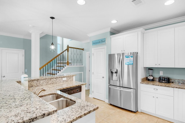 kitchen with crown molding, visible vents, stainless steel refrigerator with ice dispenser, and a sink