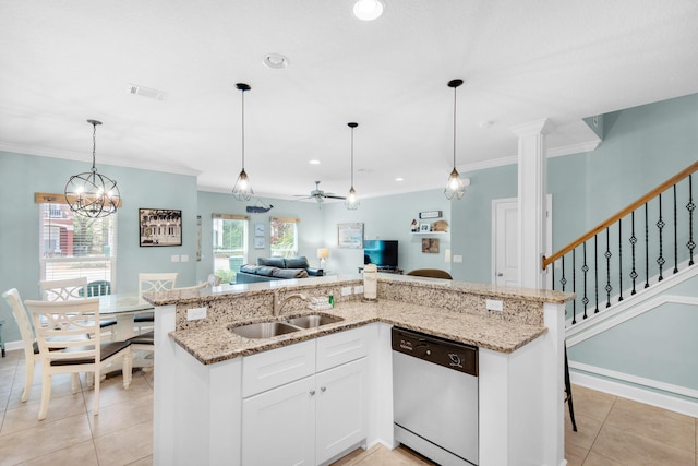 kitchen featuring light stone counters, light tile patterned flooring, a sink, open floor plan, and dishwasher