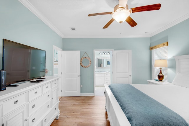 bedroom with light wood finished floors, visible vents, ornamental molding, a ceiling fan, and connected bathroom