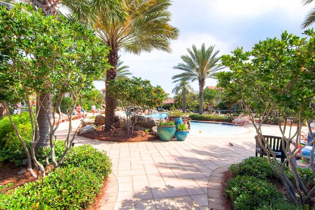 view of patio featuring a community pool