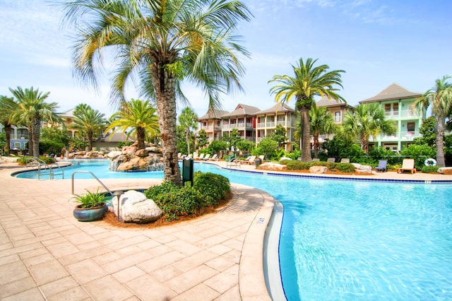 pool featuring a patio area