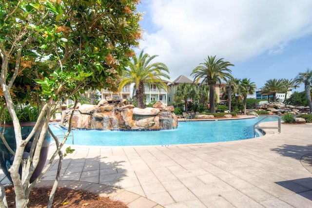 community pool with a patio