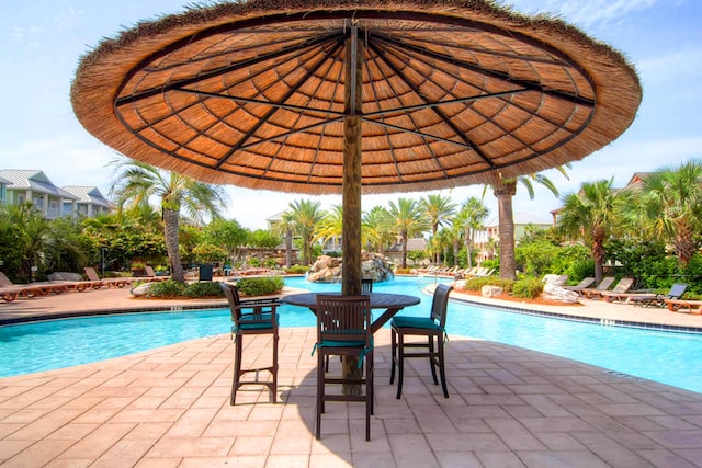 pool with a patio