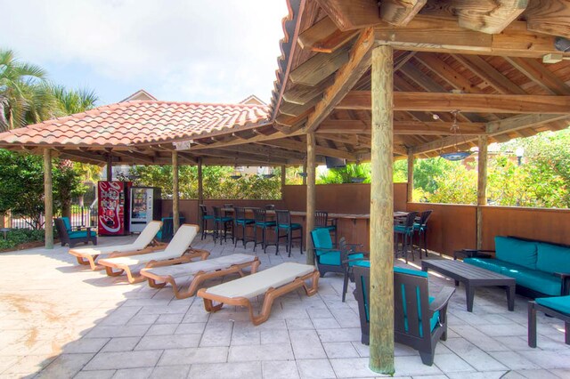 view of patio featuring an outdoor living space and a gazebo