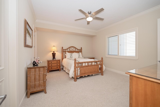 bedroom with baseboards, ornamental molding, and light colored carpet