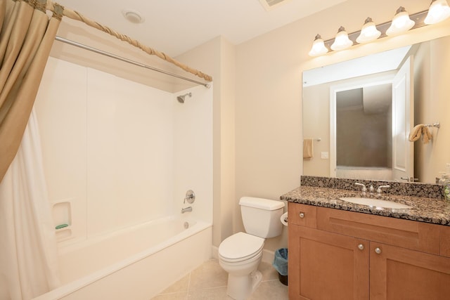 full bath featuring tile patterned flooring, shower / tub combo with curtain, vanity, and toilet