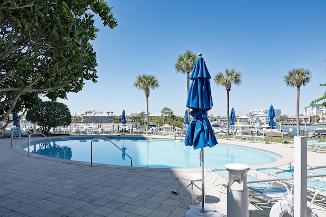 community pool with a patio