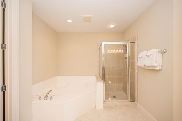 bathroom featuring a shower stall, visible vents, a bath, and tile patterned floors