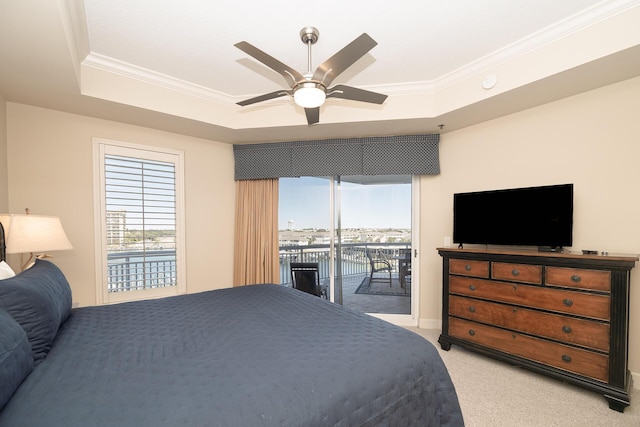 bedroom featuring ornamental molding, access to outside, a raised ceiling, and light colored carpet