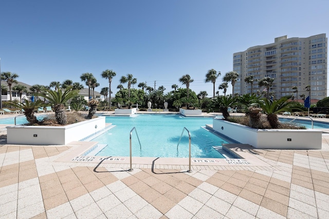 pool with a patio