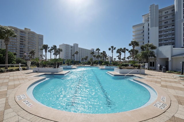 pool featuring a patio area