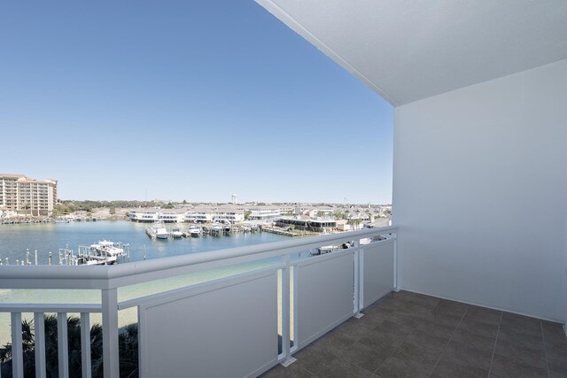 balcony featuring a water view