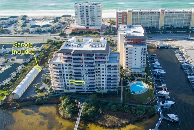 bird's eye view featuring a water view and a city view