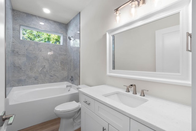 full bathroom with toilet, shower / tub combination, wood finished floors, vanity, and recessed lighting