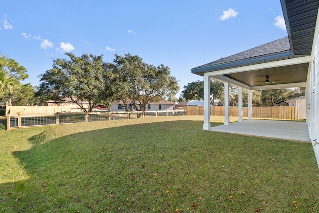 view of yard with a patio area and fence