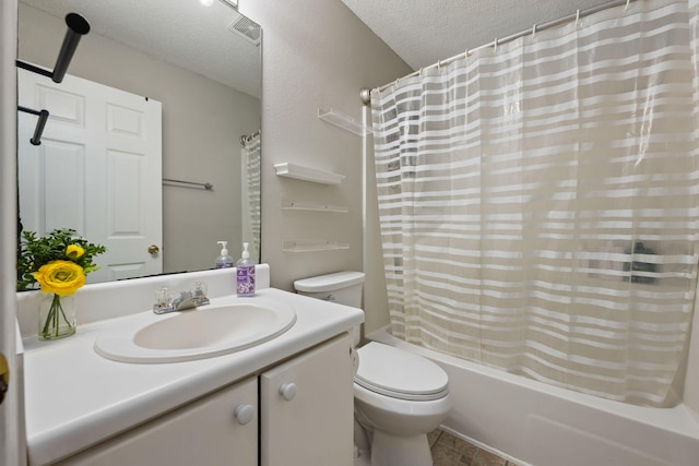 full bath with visible vents, toilet, vanity, shower / tub combo, and a textured ceiling