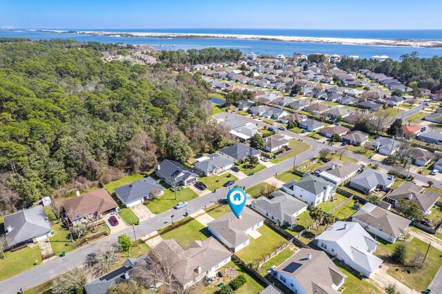 aerial view featuring a water view and a residential view