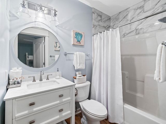 bathroom featuring shower / tub combo with curtain, vanity, and toilet