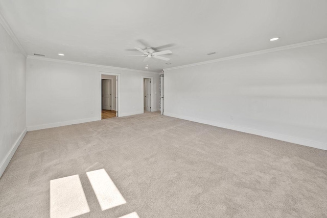 spare room featuring crown molding, recessed lighting, visible vents, ceiling fan, and baseboards