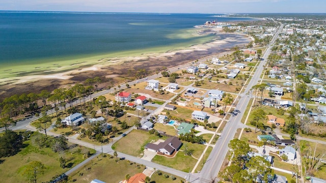 aerial view with a beach view and a water view