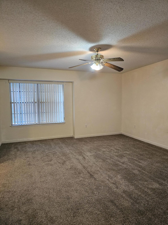946 Ashley Ln Unit C, Fort Walton Beach, FL 32547 - empty room with dark carpet, a ceiling fan, a textured ceiling, and baseboards