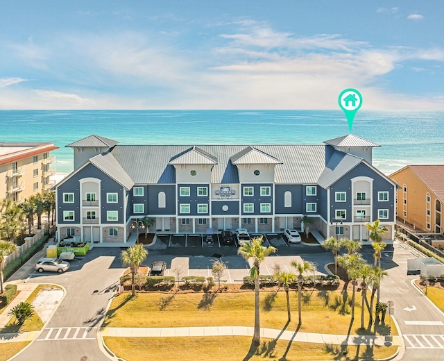 birds eye view of property featuring a water view