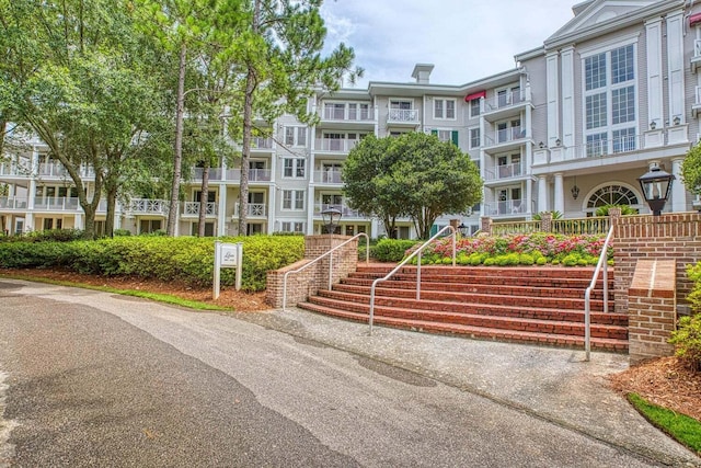 view of building exterior featuring stairs