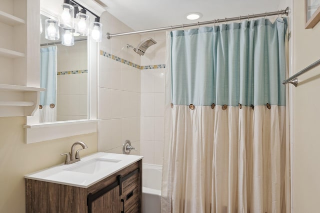 bathroom featuring vanity and shower / bath combo with shower curtain