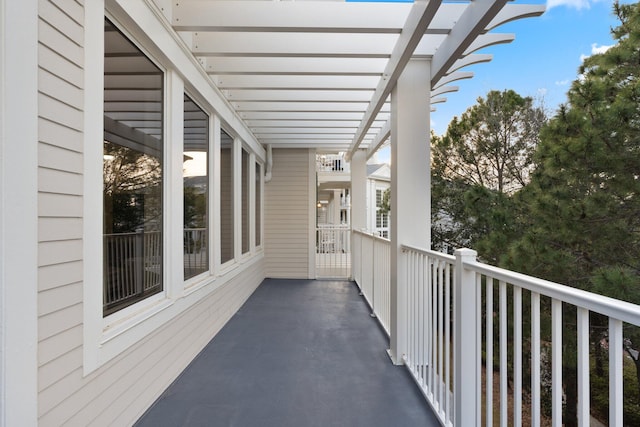 balcony featuring a pergola