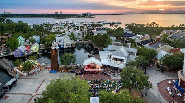 aerial view at dusk with a water view