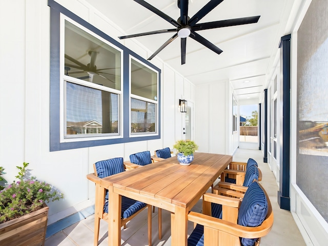 exterior space featuring a ceiling fan and outdoor dining area