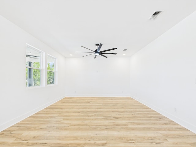 unfurnished room featuring ceiling fan, recessed lighting, visible vents, baseboards, and light wood-type flooring