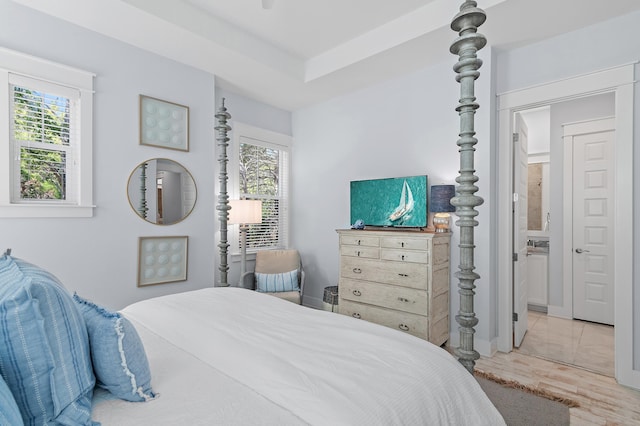 bedroom with wood finished floors