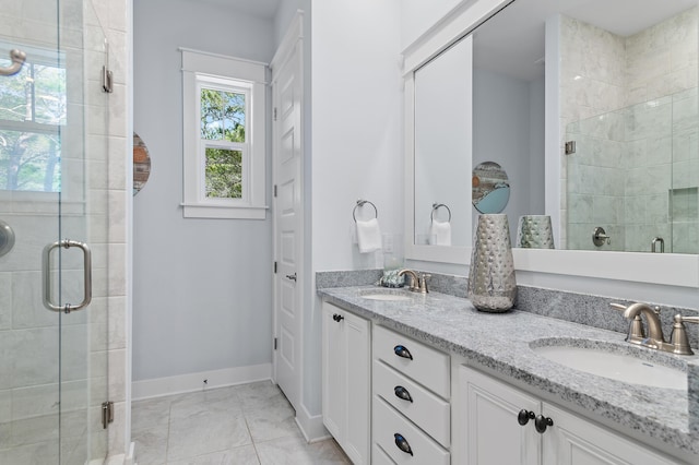 full bathroom with a shower stall and a sink