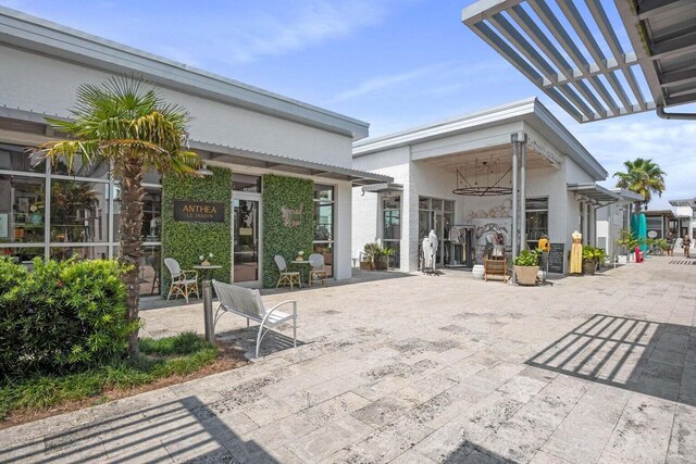 view of patio featuring a pergola