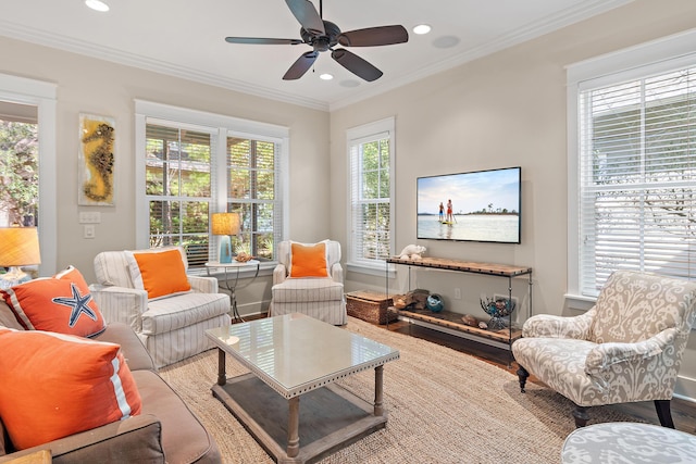 living area featuring recessed lighting, wood finished floors, and crown molding