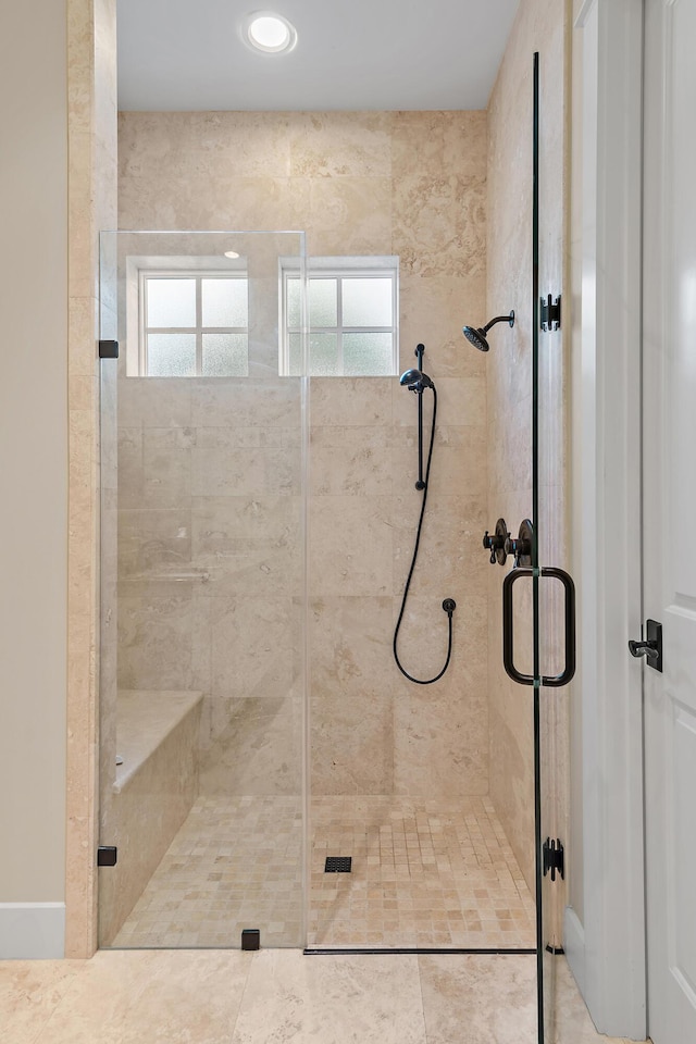 bathroom with a shower stall