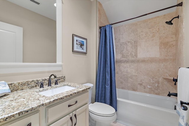 full bathroom with shower / bath combination with curtain, vanity, and toilet