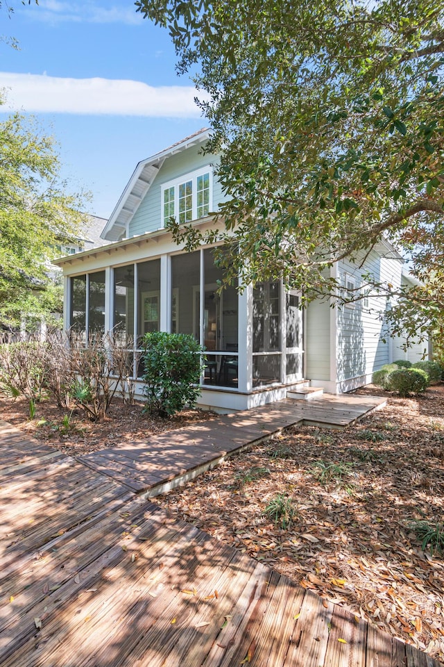 view of front of property with a sunroom