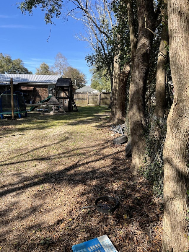 view of yard with fence