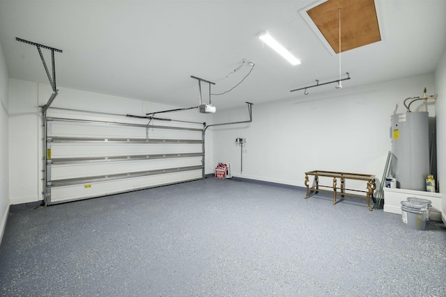 garage with a garage door opener, water heater, and baseboards