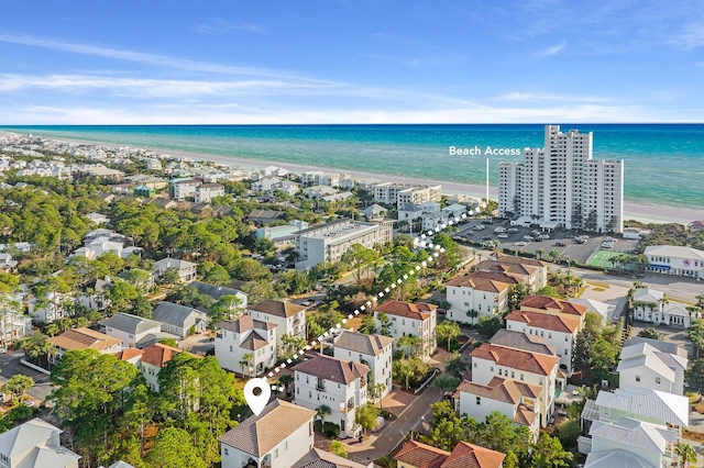 aerial view with a view of the beach and a water view