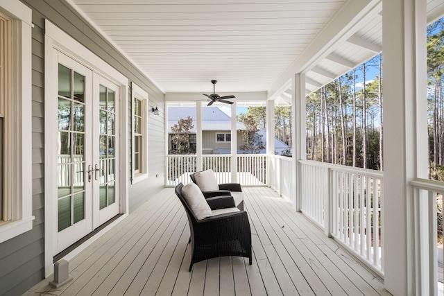 44 Thicket Cir, Santa Rosa Beach, FL 32459 - wooden terrace with french doors and a porch