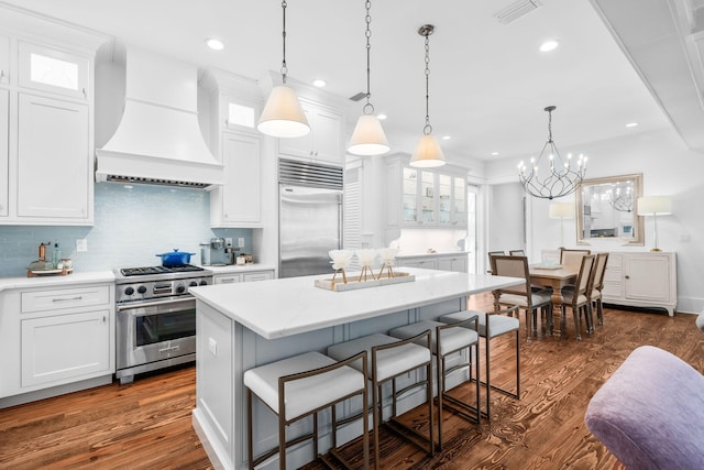 44 Thicket Cir, Santa Rosa Beach, FL 32459 - kitchen featuring high end appliances, custom exhaust hood, white cabinets, and recessed lighting